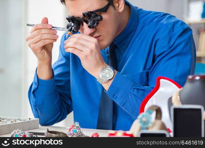 Jeweler working with luxury jewelry in the workshop