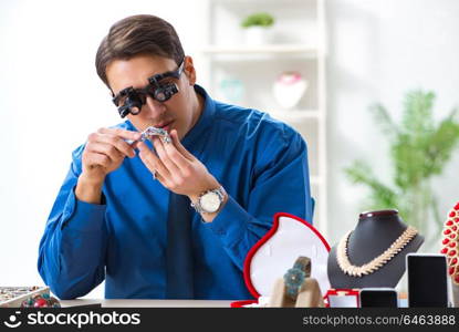 Jeweler working with luxury jewelry in the workshop