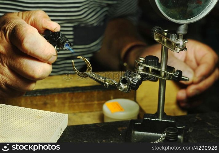 jewelery making in the workshop of a goldsmith