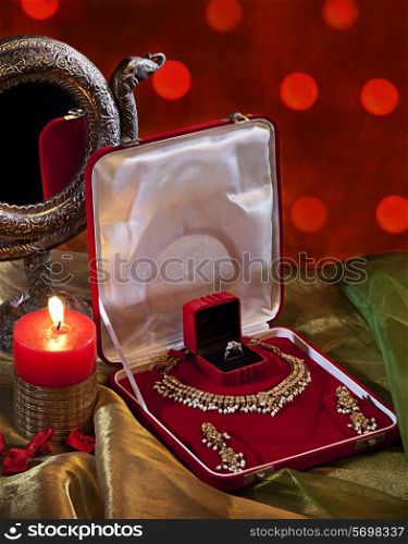 Jewelery set and candle