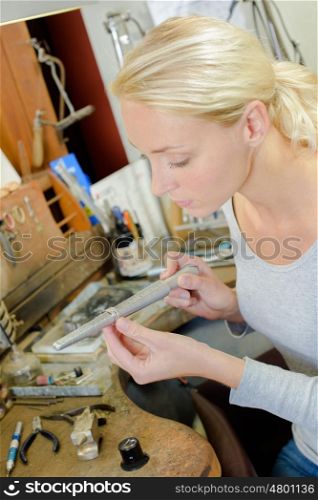 Jeweller in her workshop