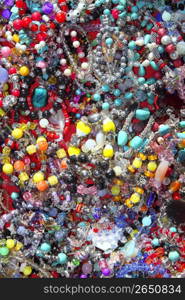 jewellery mixed colorful many jewels plastic jewelry background
