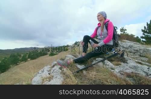 JIB CRANE: Day hiking in Crimean mountains woman hiker enjoying view of amazing Ai-Petri plateau