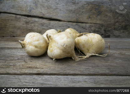 jicama on grunge wooden background