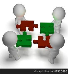 Jigsaw Pieces Being Joined Shows Teamwork And Assembling. Jigsaw Pieces Being Joined Showing Teamwork And Assembling