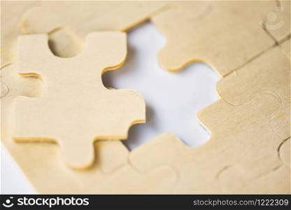 jigsaw puzzle / Close up of jigsaw pieces for joining and trying to connect business partnership concept