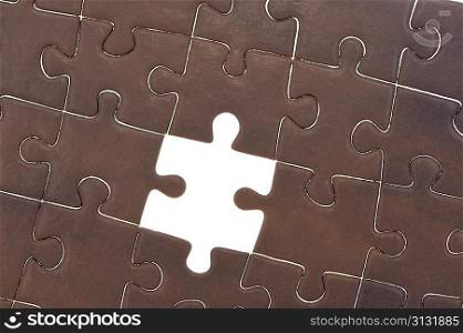 Jigsaw puzzle with one piece missing background