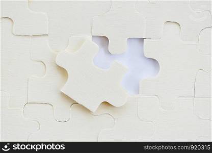 Jigsaws puzzles on white /Jigsaw pieces on texture background