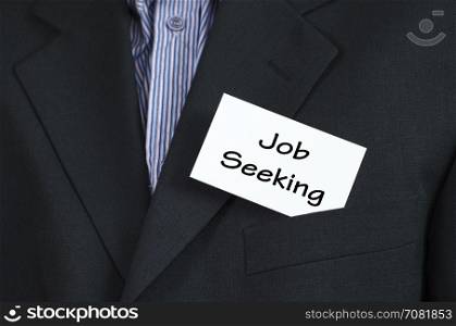 Job seeking text note concept over business man background
