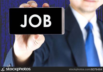 Job word on mobile phone screen in blurred young businessman hand and digital technology background