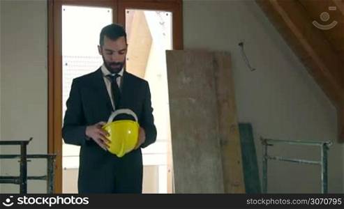 Job, young people at work, profession. Confident worker, business man smiling, portrait of engineer, industry manager, businessman, architect in construction site, new apartment. 15 of 15