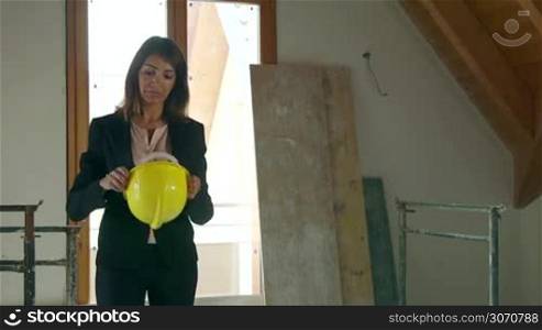 Jobs, young people at work, professions, workers. Confident business woman, businesswoman, portrait of engineer, industry manager, architect smiling in construction site, new house. 3 of 15