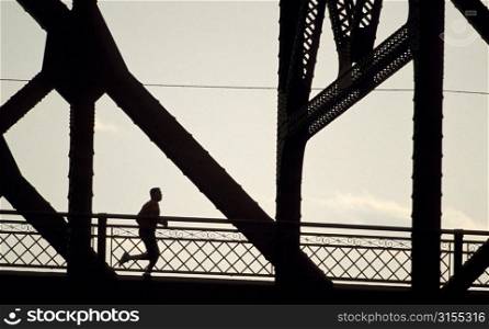 Jogger in Huge Industrial Structure