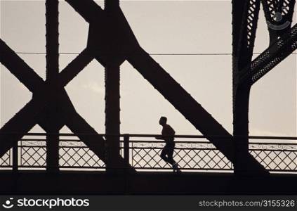 Jogger in Huge Industrial Structure