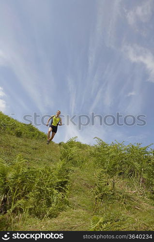 Jogger Running in Meadow