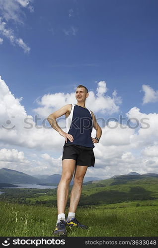 Jogger Standing in Meadow