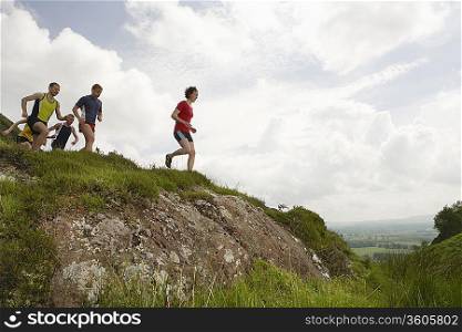Joggers Running Downhill
