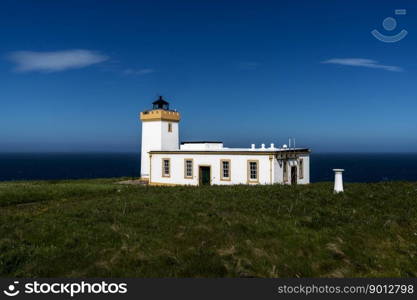 John O&rsquo;Groats, United Kingdom - 26 June, 2022: view of the historic Duncansby Head Lighthouse in northern Scotland