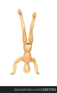 Jointed wooden mannequin doing handstands isolated on white background