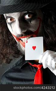 Joker with cards in studio shoot