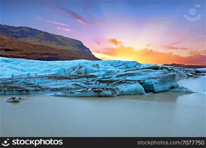 Jokulsarlon, glacier and lake at Iceland at sunset
