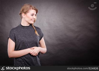 Joy and happiness concept. Gorgeous lovely smiling girl portrait. Blonde young woman full of positive emotions. Happy enjoyable lady on gray.. Happy joyful woman portrait.
