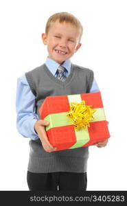 Joyful boy holding present box . Isolated on white background