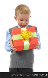 Joyful boy holding present box . Isolated on white background