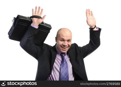 Joyful businessman with a portfolio has lifted hands upwards. Isolated on white background