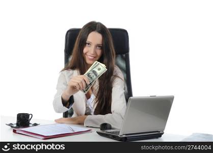 Joyful businesswoman in the office with dollar banknotes. Isolated on white