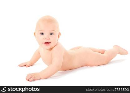 joyful naked baby is creeping on all fours and looking at camera. isolated.