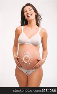 Joyful, pregnant young mother - isolated