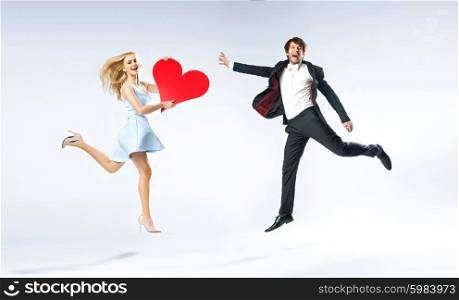 Joyful young couple during valentine&rsquo;s day