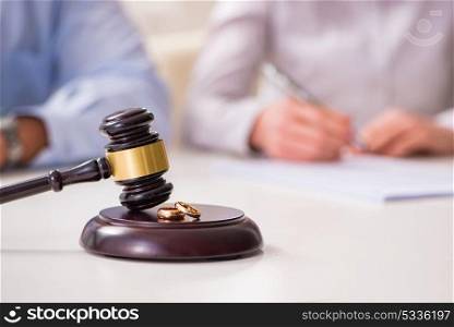 Judge gavel deciding on marriage divorce