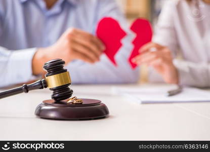 Judge gavel deciding on marriage divorce