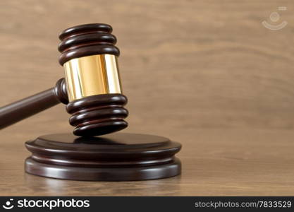 judge gavel on the brown wooden background