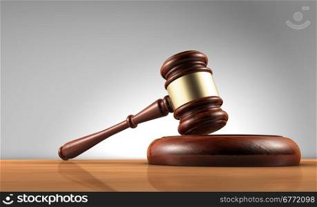 Judge, law, lawyer and Justice concept with a 3d render of a gavel on a wooden desktop with grey background.