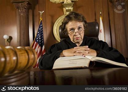 Judge sitting in court, portrait
