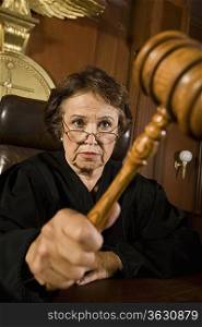 Judge using gavel in court