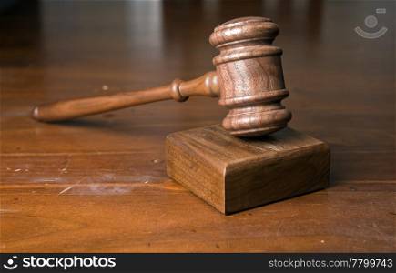 judges or auctioneers gavel on wooden table