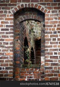 Jueterbog-wall window opening. Detail of the old city wall of Juterbog, Brandenburg, Germany