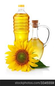 Jug and bottle of sunflower oil with flower isolated on white background
