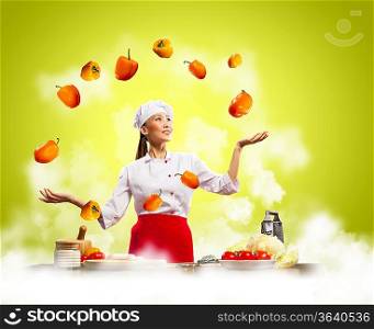 juggler female asian cook against color background