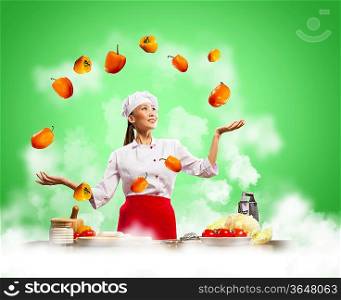 juggler female asian cook against color background