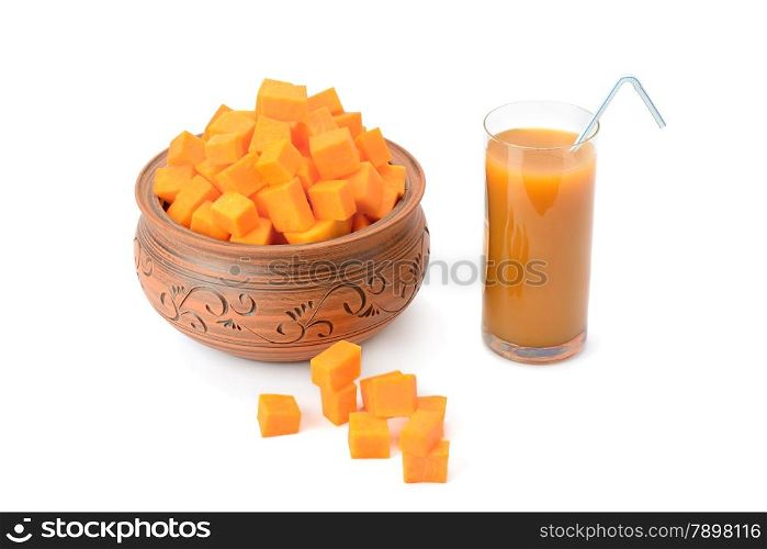juice in glass and pumpkin isolated on white background