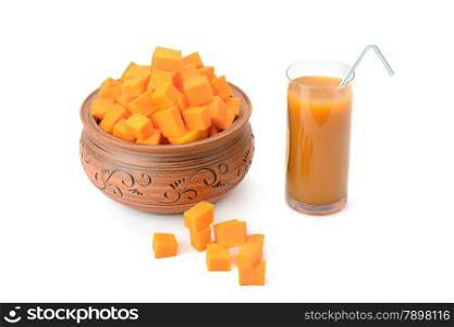 juice in glass and pumpkin isolated on white background