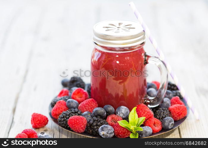 Juice of fruits of the forest. Refreshing juice of fruits of the forest