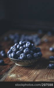 juicy and fresh blueberries on a beautiful background in a bowl