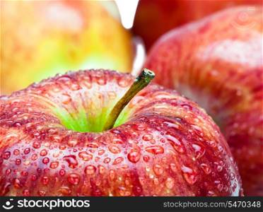 juicy apples in drop of water