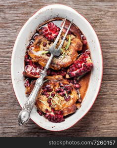 Juicy, delicious pork chops with in pomegranate sauce. Grilled chop in pomegranate sauce